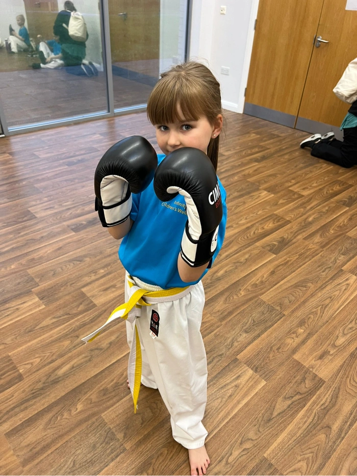 Girl with boxing gloves